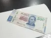 Detectan pago con billete falso en gasolinera y conductor se da a la fuga