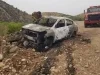 Encuentran auto de alquiler incendiado en carretera internacional