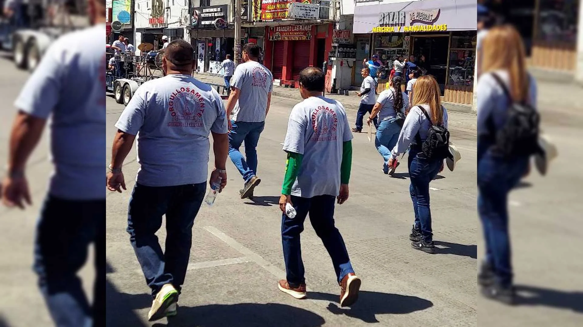 Expresan trabajadores consignas en desfile por el Día del Trabajo