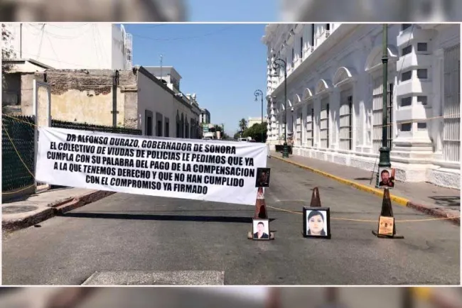 Exigen viudas de policías pago de compensaciones