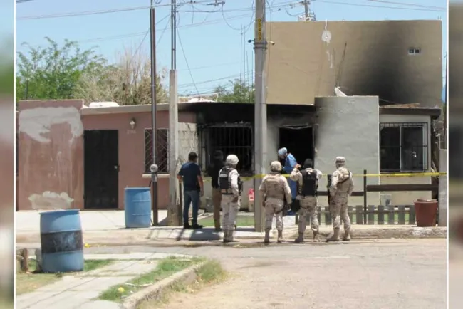 Ejecutan a dos hombres y queman casa en infonavit La Esperanza