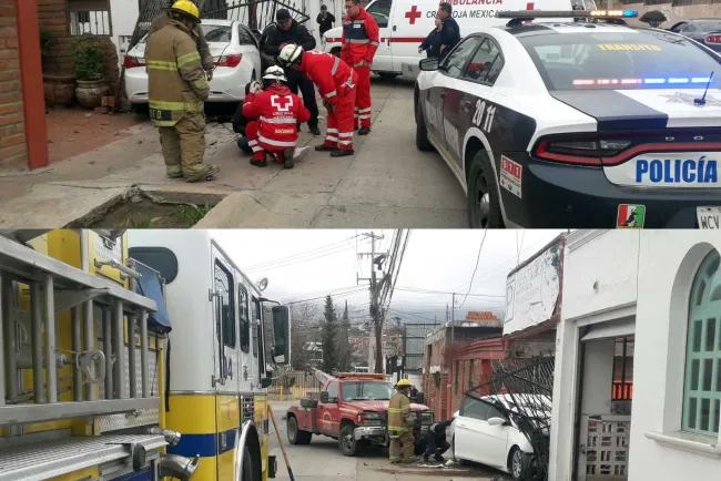 Se impactan contra portón de negocio; resulta mujer lesionada