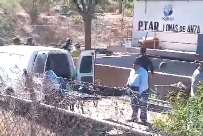 Localizan cuerpo sin vida en pila de aguas negras