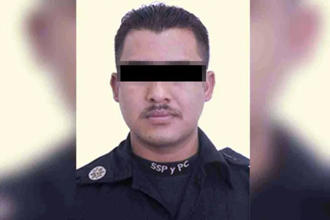 Capturan a policía acusado de aseninar a normalista