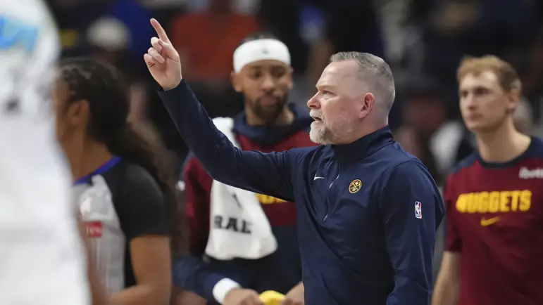 Malone fuera de Denver tras el campeonato
