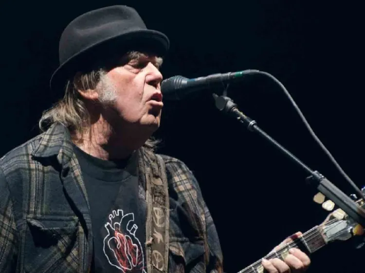 Reproducciones de Neil Young aumentan un 26% en Deezer tras polémica con Spotify