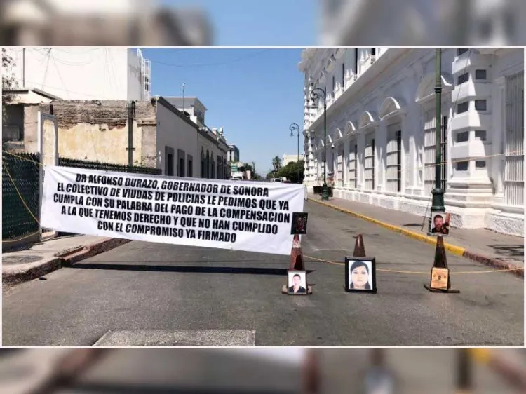 Exigen viudas de policías pago de compensaciones