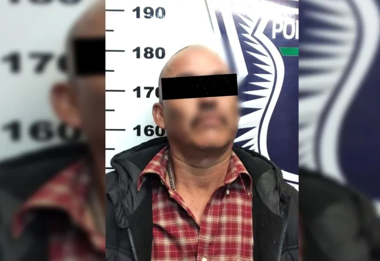 Detienen a conductor ebrio y armado