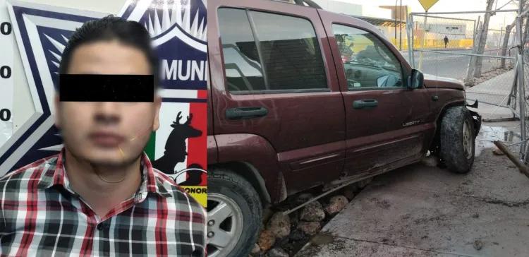 Detienen a conductor ebrio tras chocar contra cerco