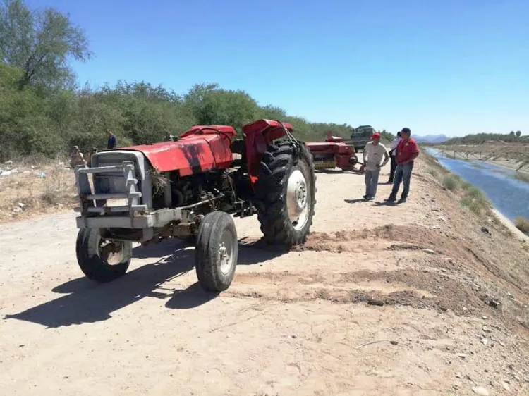 Rescatan cuerpo
de un canal