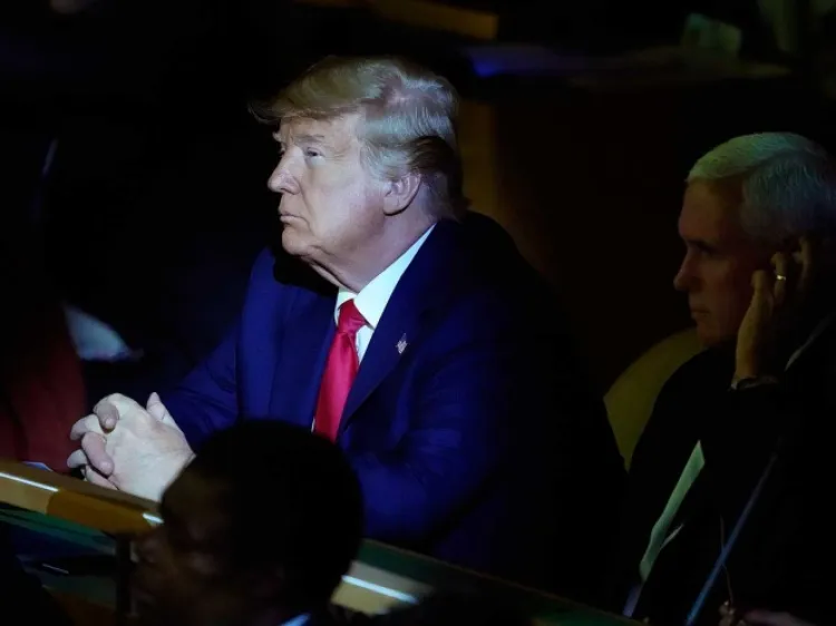 Trump llega de sorpresa a cumbre del clima