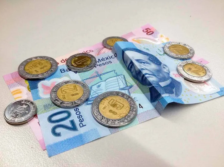 Inicia el peso con ganancia de 63 centavos frente al dólar