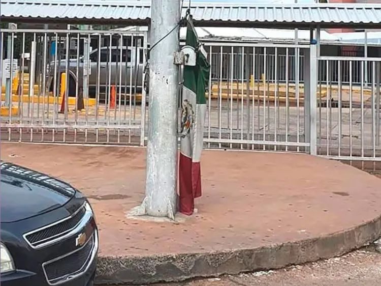 Indigna bandera maltratada