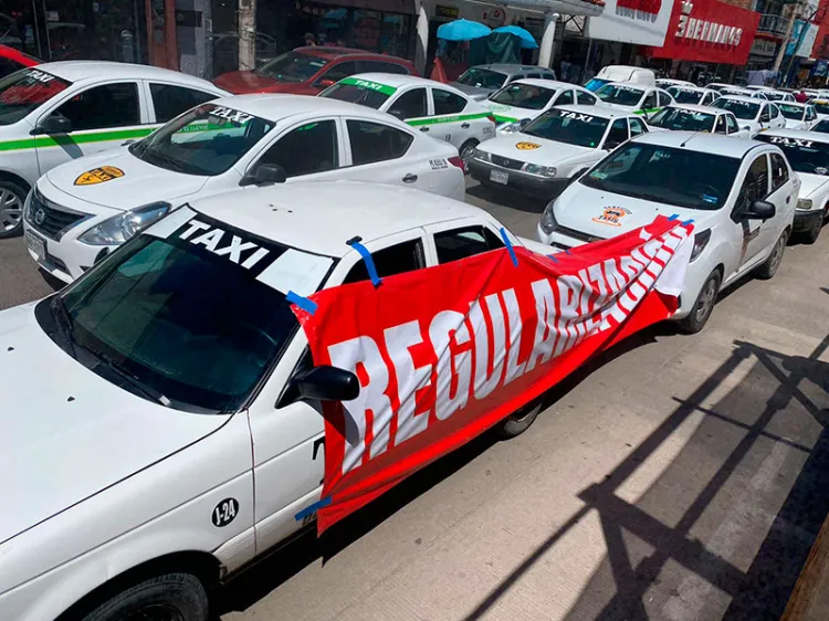 Buscan regularizar permisos de 500 taxis