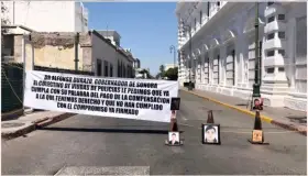 Exigen viudas de policías pago de compensaciones