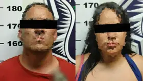 Por posesión de arma de fuego fue arrestada una pareja