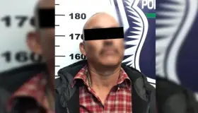 Detienen a conductor ebrio y armado