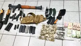 Localizan arsenal tras un tiroteo