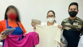 Confeccionan batas y cubre-bocas