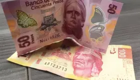 Debilita al peso fortalecimiento del dólar